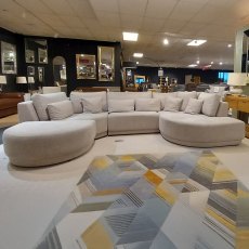 Lucca 4 + Seater Curved Corner Sofa Including Curved Footstool Fabric PR Ash Grey Lucca 4 + Seater Curved Corner Sofa Including Curved Footstool Fabric PR Ash Grey