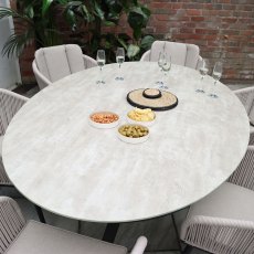 Bali 6 Person Light Sandstone Outdoor Dining Set With Ceramic Oval Glass Table Top & Rope Dining Cha