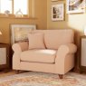 Hazel Snuggler Fabric Ansell Rusty Rose With Burnished Beech Leg Lifestyle