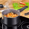 Judge Essentials Non-Stick 4 Piece Saucepan Set Black Lifestyle on hob