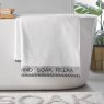 Catherine Lansfield Relax & Unwind Bath Sheet White Lifestyle on Bath