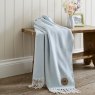 Arcadia Jacquard Throw 130cm x 170cm Blue Fog Lifestyle on bench